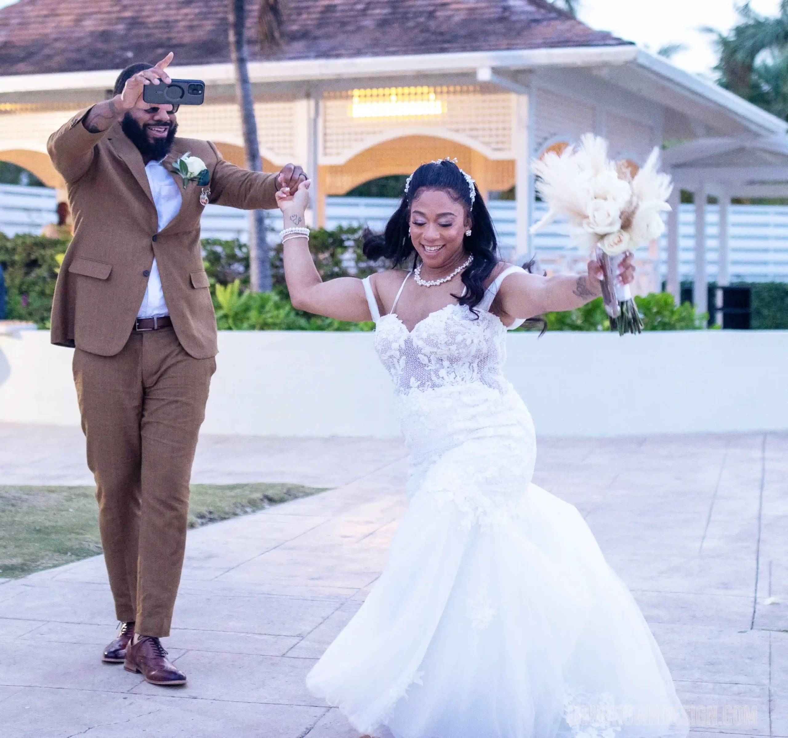 destination wedding photography bride and groom walking in scaled